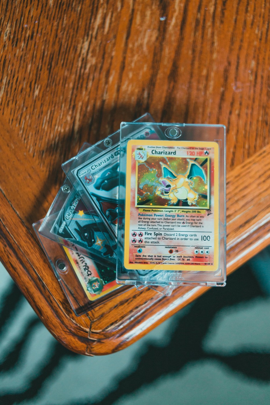 Pokemon card foil curl guide: why holo cards bend and how collectors reduce damage